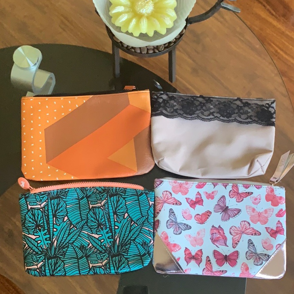 Bundle Of 4 Makeup Bags With Samples